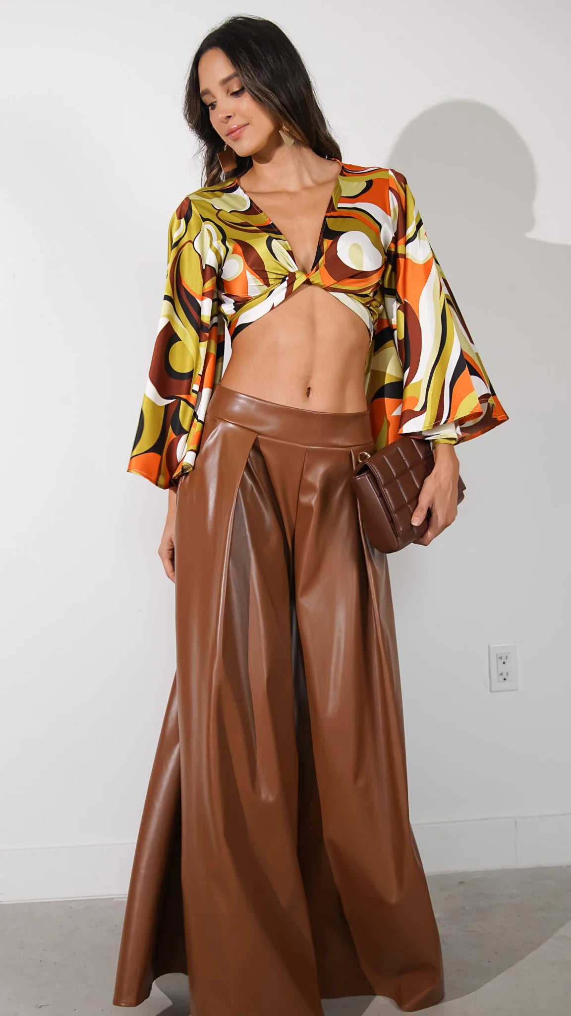AVERIE FAUX LEATHER PALAZZO PANTS.