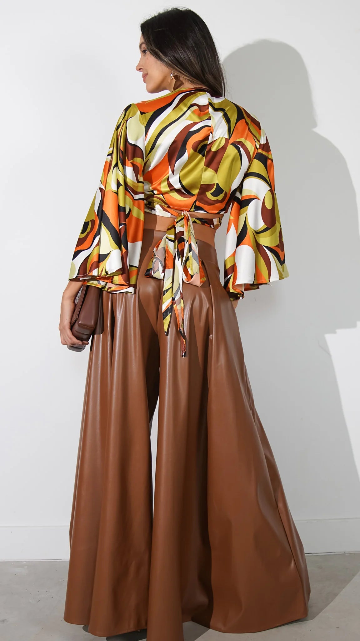 AVERIE FAUX LEATHER PALAZZO PANTS.